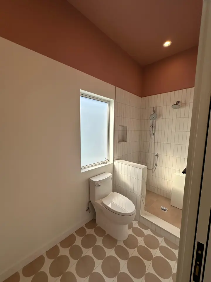 Bathroom with painted ceiling and freshly finished walls