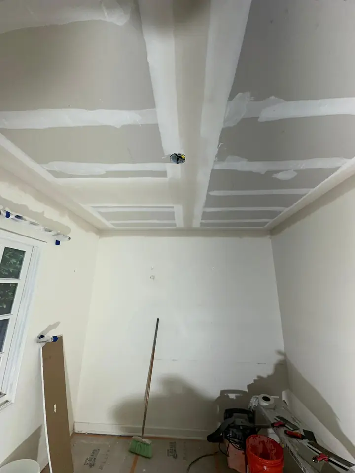 White coffered ceiling detail after painting