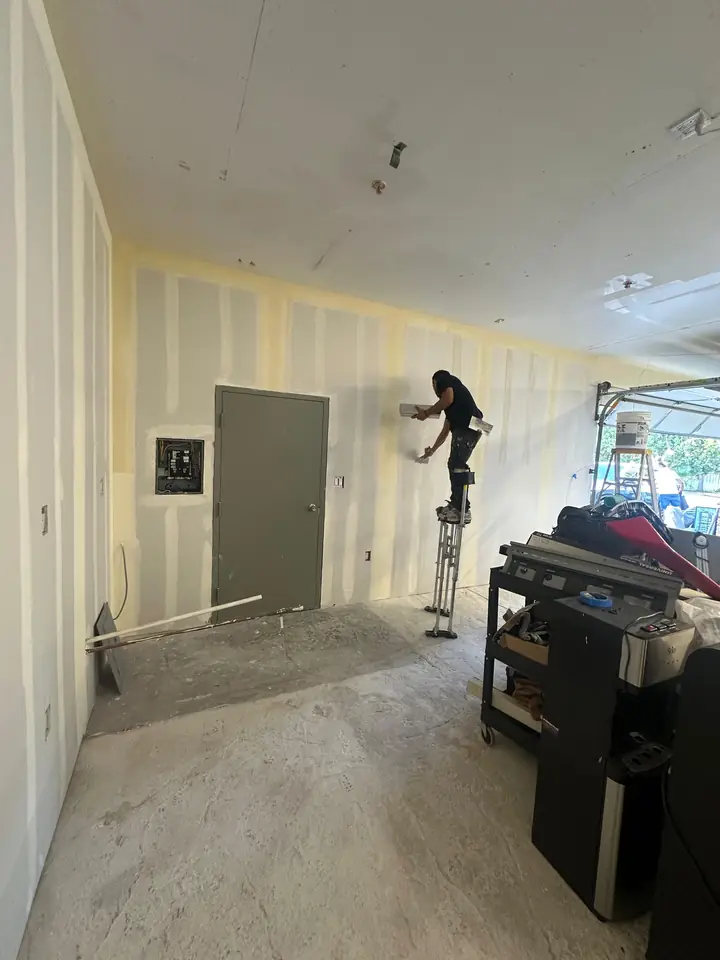 Master Painting crew preparing an interior for painting
