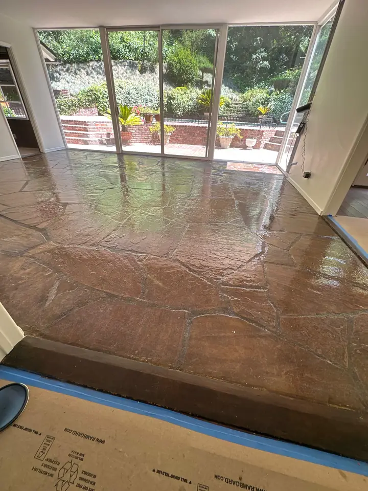 Interior with high-gloss finished floor and floor-to-ceiling windows