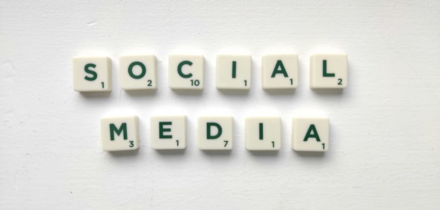 Close-up of hands using smartphone with ChatGPT app open on screen.